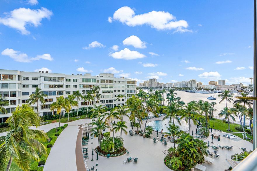 Meticulously Renovated Two Bedroom Two Bath Apartment with Open Terrace & Gorgeous Views of Lake and West Palm Beach Skyline. Move-in Perfection at Premier Full Service In-Town Property. Fabulous Heated Pool on The Lake. Exquisitely Renovated Resident Hallways.
