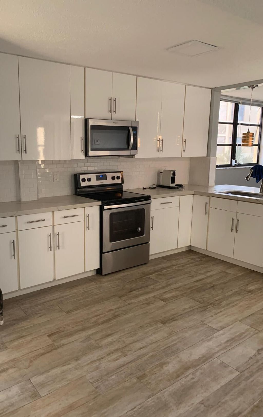 Photo of 6475 W Oakland Park Boulevard #401, Lauderhill, FL 33313 (MLS # B26006124)