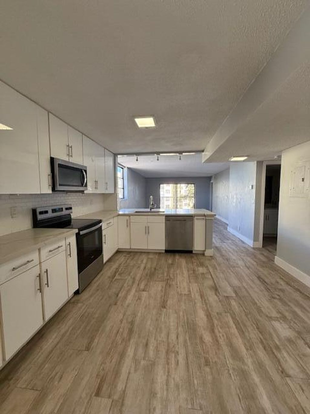 Photo of 6475 W Oakland Park Boulevard #401, Lauderhill, FL 33313 (MLS # B26006124)