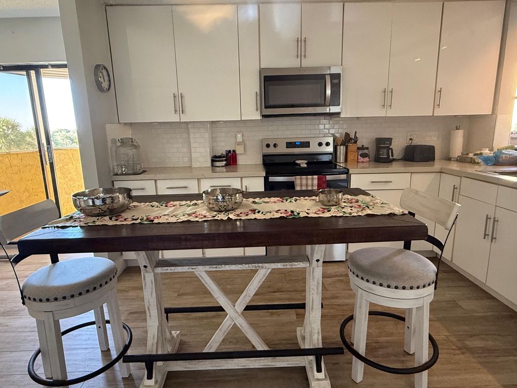 Photo of 6475 W Oakland Park Boulevard #401, Lauderhill, FL 33313 (MLS # B26006124)