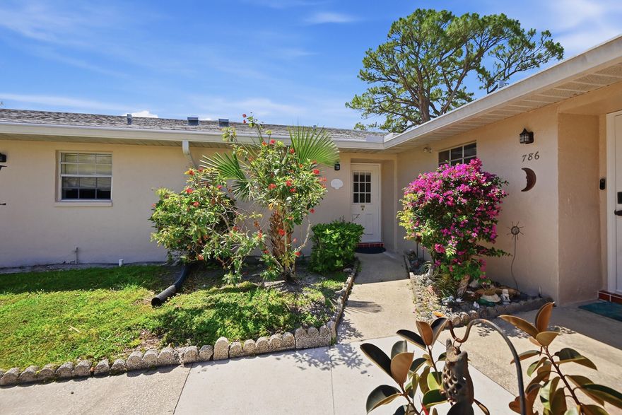 Bright and inviting 2 bedroom, 2 bathroom villa in the highly sought after Covered Bridge 55+ community. This well maintained condo offers 941 square feet of comfortable living space with a prime corner location that delivers extra privacy and abundant natural light. Key updates include a 2023 roof, 2019 A/C, and freshly painted exterior. The home features a spacious floor plan and glass enclosed patio ideal for year round relaxation. Residents enjoy a pet friendly, resort-style lifestyle with outstanding amenities including clubhouse, fitness center, billiards room, library, and two heated pools. Conveniently located near shopping, dining, medical facilities, and major roadways, this home is perfect for both full and part-time living. Seller can leave some furnishings for the buyer.