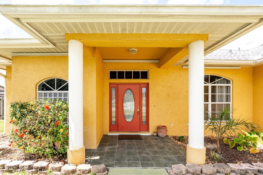 Photo of 220 SE Verada Avenue, Port Saint Lucie, FL 34983 (MLS # R11076510)