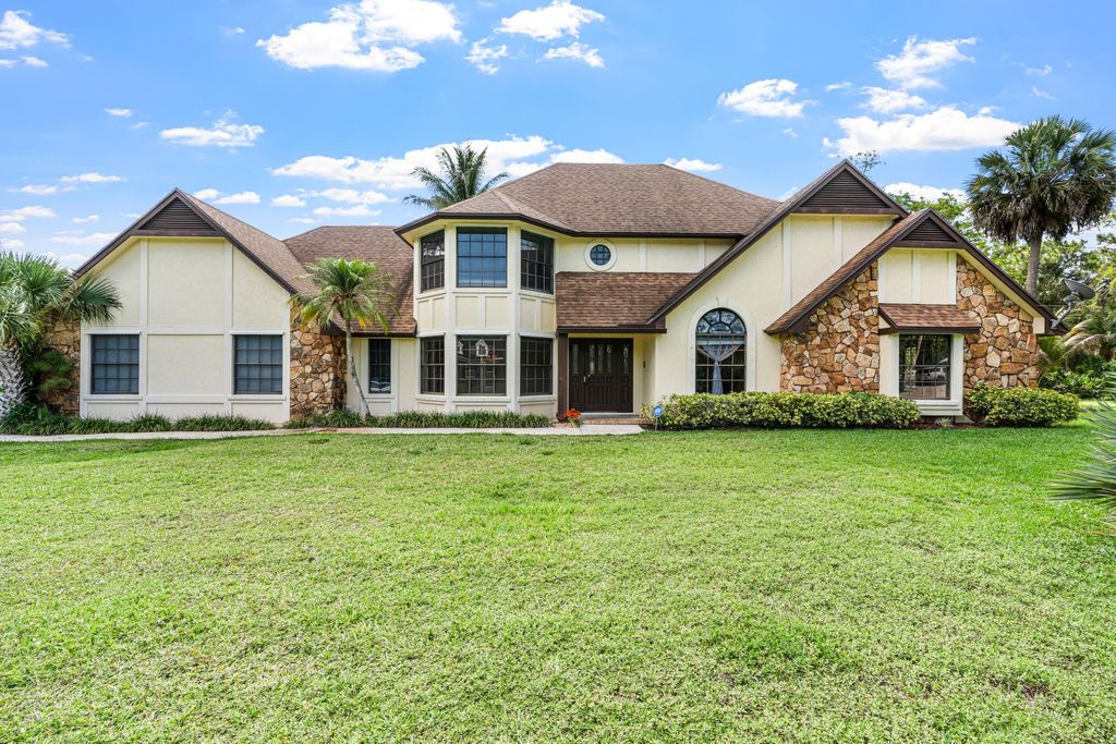 Photo of 3693 Valley Park Way, Wellington, FL 33467 (MLS # B26031710)
