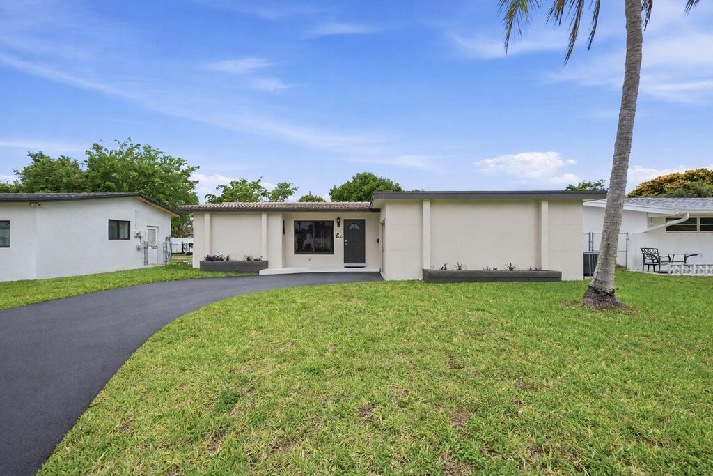 Photo of 2141 NW 73rd Avenue, Sunrise, FL 33313 (MLS # B26002730)