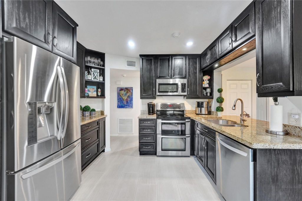 Photo of 5530 Coach House Circle #A, Boca Raton, FL 33486 (MLS # F10500381)