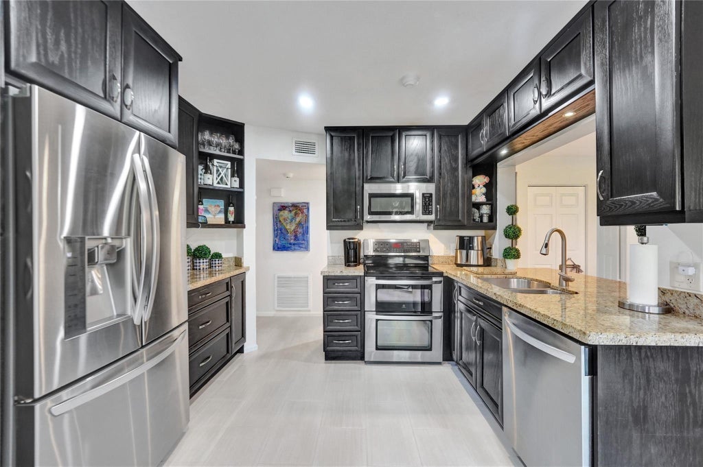 Photo of 5530 Coach House Circle #A, Boca Raton, FL 33486 (MLS # F10500381)