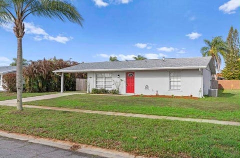 Photo of 850 SW GOODRICH Street, Port Saint Lucie, FL 34983 (MLS # B26080939)