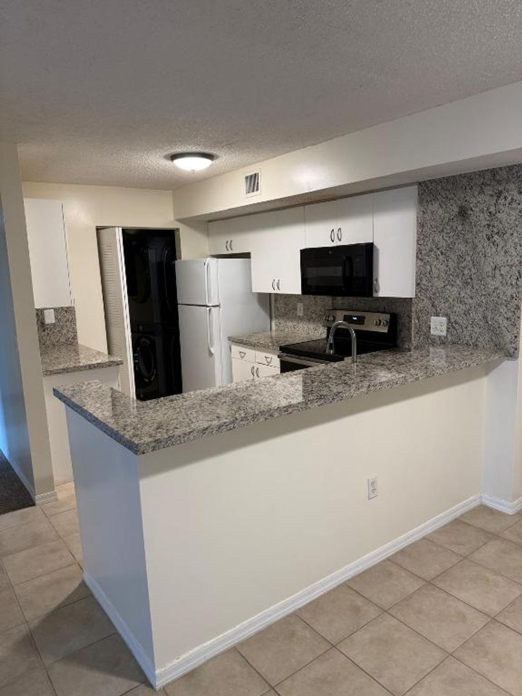 Photo of 3830 Lyons Rd #212, Coconut Creek, FL 33073 (MLS # R11050058)