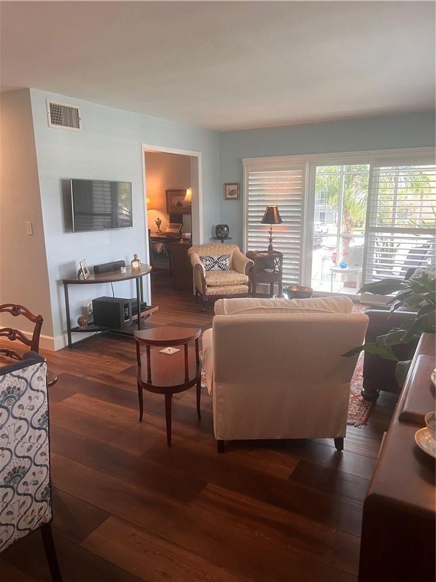 Look no furtheer. This beautiful 2/1 corner unit is located in River Shores and boasts an updated kitchen with Dutch Made custom cabinetry. Luxury vinyl flooring was recently installed in addition to updated electrical panel with surge protector. The unit features impact windows, plantation shutters and LED lighting in hllway, bathroom and closet. New 5.5 inch baseboards were also installed. The custom built vanity in the bathroom and closet are also a beautiful upgrade. Dont miss out on this fantastic condo. Close to the beach, airport, nightlife, shopping, and restaurants. Boat dock available to rent. This is defintitely the unit you want to call home. Professional photos coming soon.