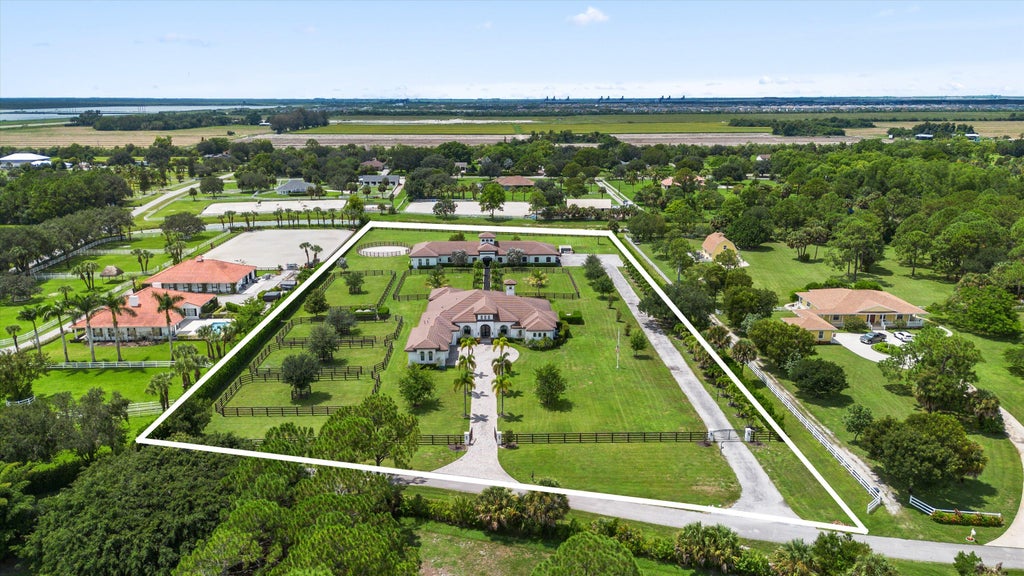 Photo of 843 STALLION Drive, Loxahatchee, FL 33470 (MLS # B26073952)