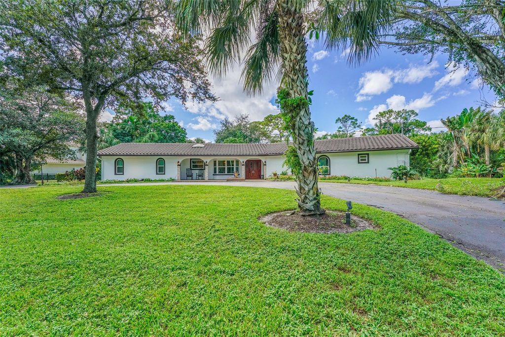 Photo of 5351 Godfrey Rd, Parkland, FL 33067 (MLS # F10532134)