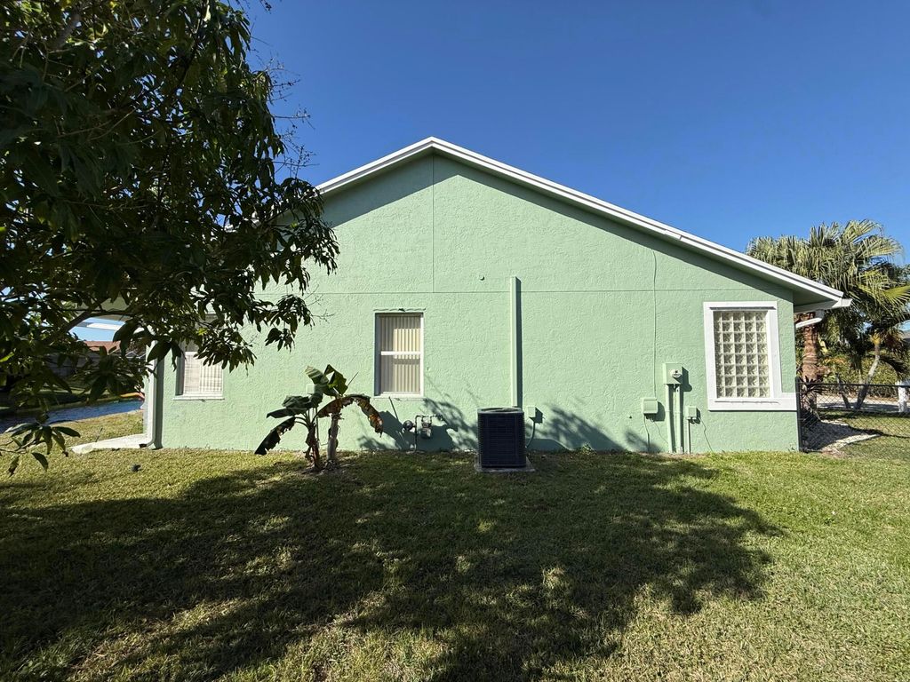 Photo of 1168 Hatteras Circle, Greenacres, FL 33413 (MLS # B26021272)