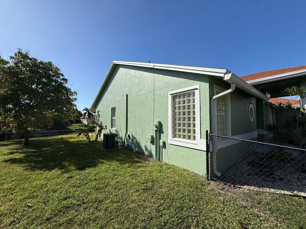 Photo of 1168 Hatteras Circle, Greenacres, FL 33413 (MLS # B26021272)