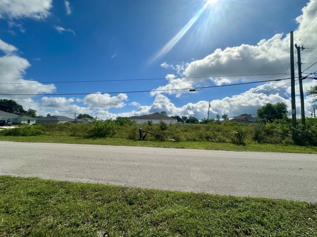 Photo of 690 SW Gailbreath Avenue, Port Saint Lucie, FL 34953 (MLS # R11119811)