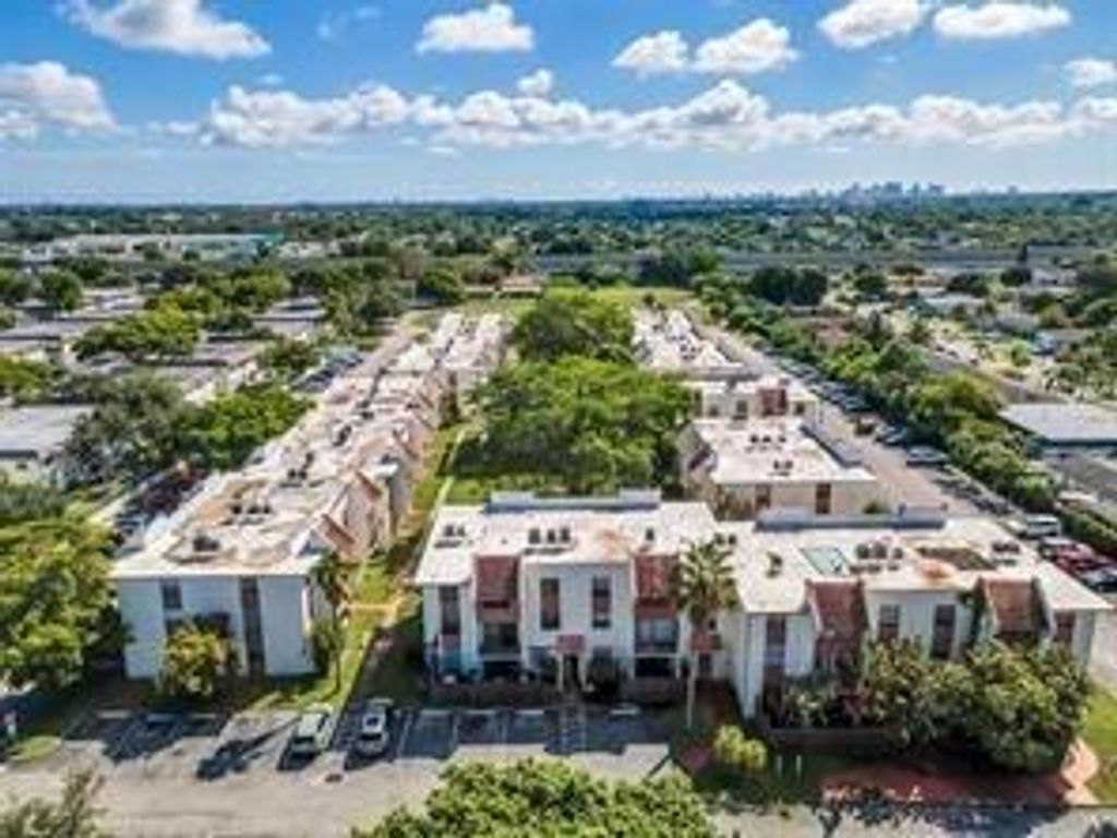 Photo of 1744 NW 55th Ave #102, Lauderhill, FL 33313 (MLS # F10531939)