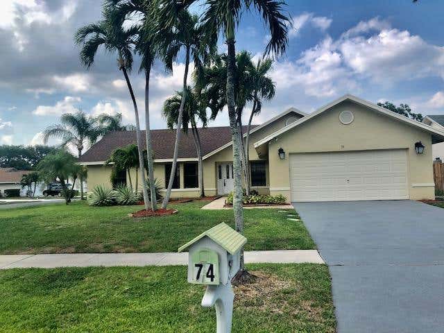 Photo of 74 Cedar Circle, Boynton Beach, FL 33436 (MLS # R10718487)