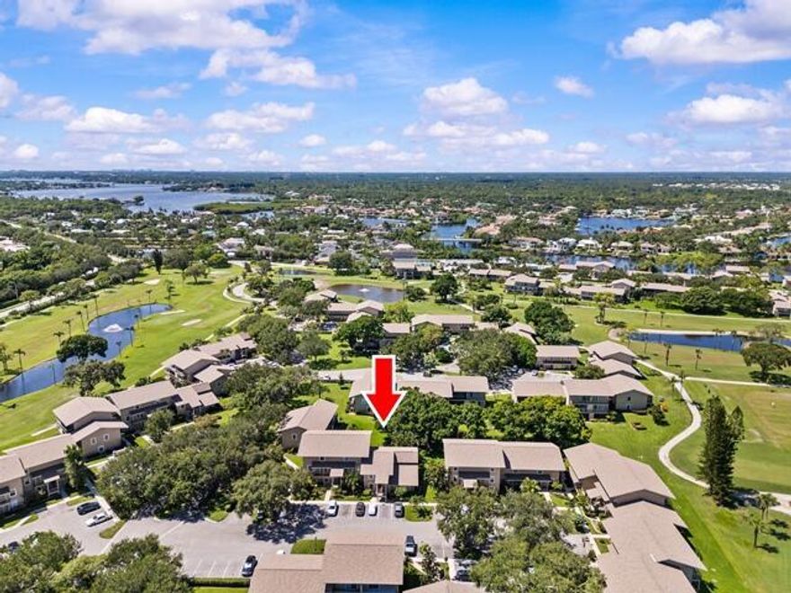 PERFECT TURN-KEY GOLF CONDO!!  Everything is NEW and ready for you, garnished with a couple of nostalgic appliances.  New A/C, New HURRICANE WINDOWS & SLIDERS, 2 New BALCONIES, New ROOF, New INSULATION, New APPLIANCES, New REMOTE-CONTROL SHADES, New FRONT DOOR, & New PAINT, too!!   Perfect location with private golf course, heated pool, canoes on the intracoastal, private tennis and pickleball courts, close to beaches, shopping, dining, and everything.  NO SPECIAL ASSESSMENTS!  Two assigned parking places, plenty of guest parking.  Private Storage Unit.   Relax and feel the fresh air.  Have a beverage on one of the balconies.  Toast your fabulous find and your HIDDEN GEM IN JUPITER!