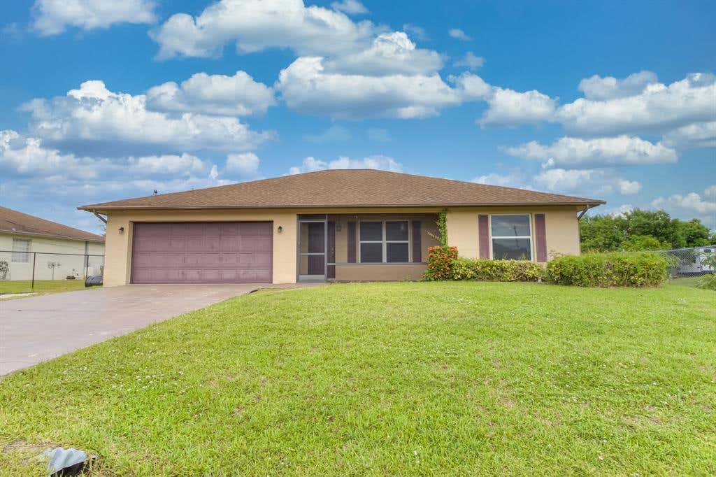Photo of 3233 SW Hickenlooper Street St, Port St Lucie, FL 34983 (MLS # R10822495)