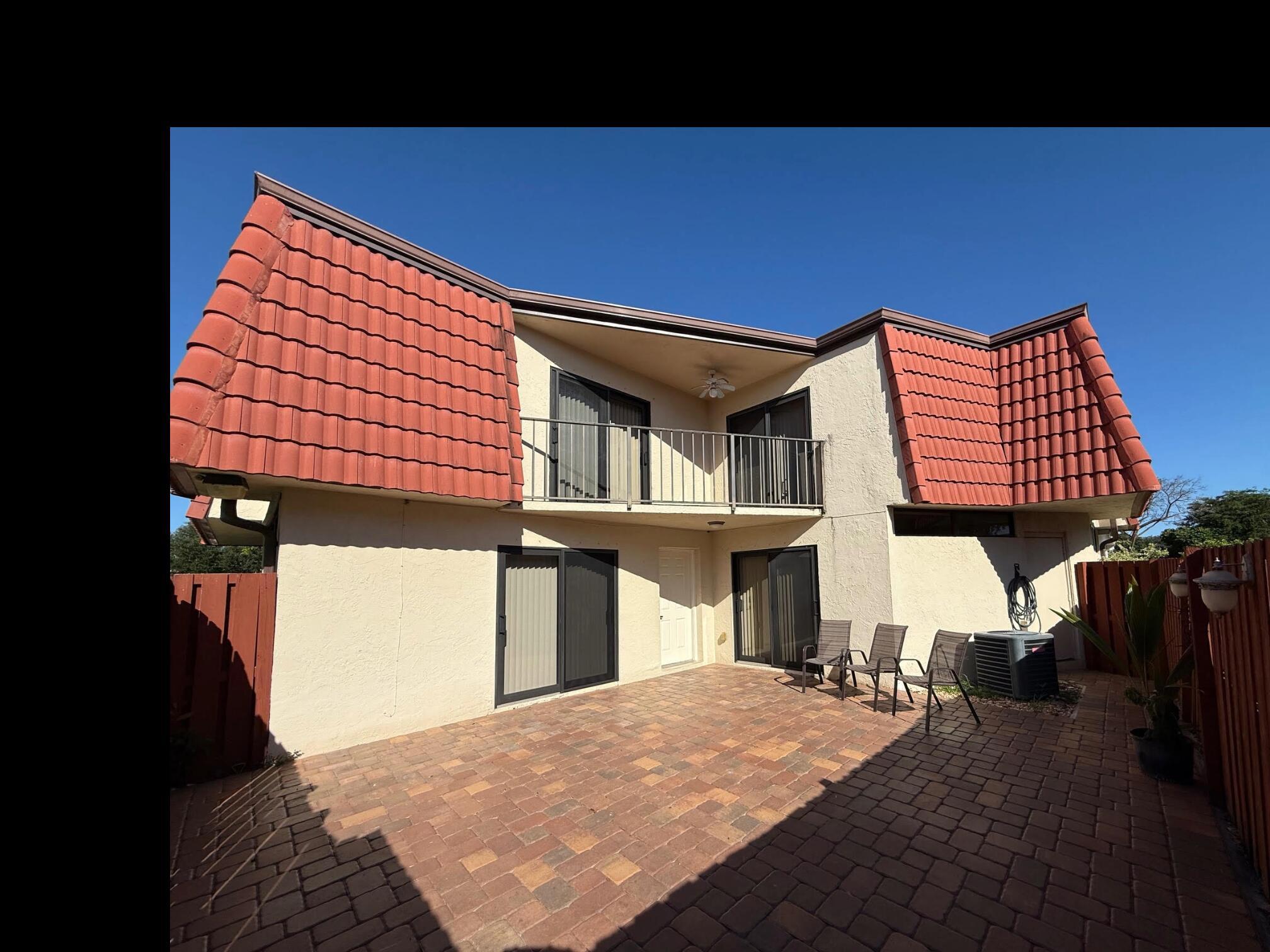 Immaculate townhouse with privacy fence patio. Centrally located!! Property has tile and laminated floors throughout, hurricane impact windows throughout, and a fully paved private patio perfect for outdoor enjoyment. Community amenities include a pool, tennis court, and well-maintained common areas managed by the HOA. Conveniently situated just minutes from I-95, beaches, major highways, shopping centers, supermarkets, and restaurants. Move-in ready! Good rated schools. First, last, and security deposit moves you in! HOA approval required.