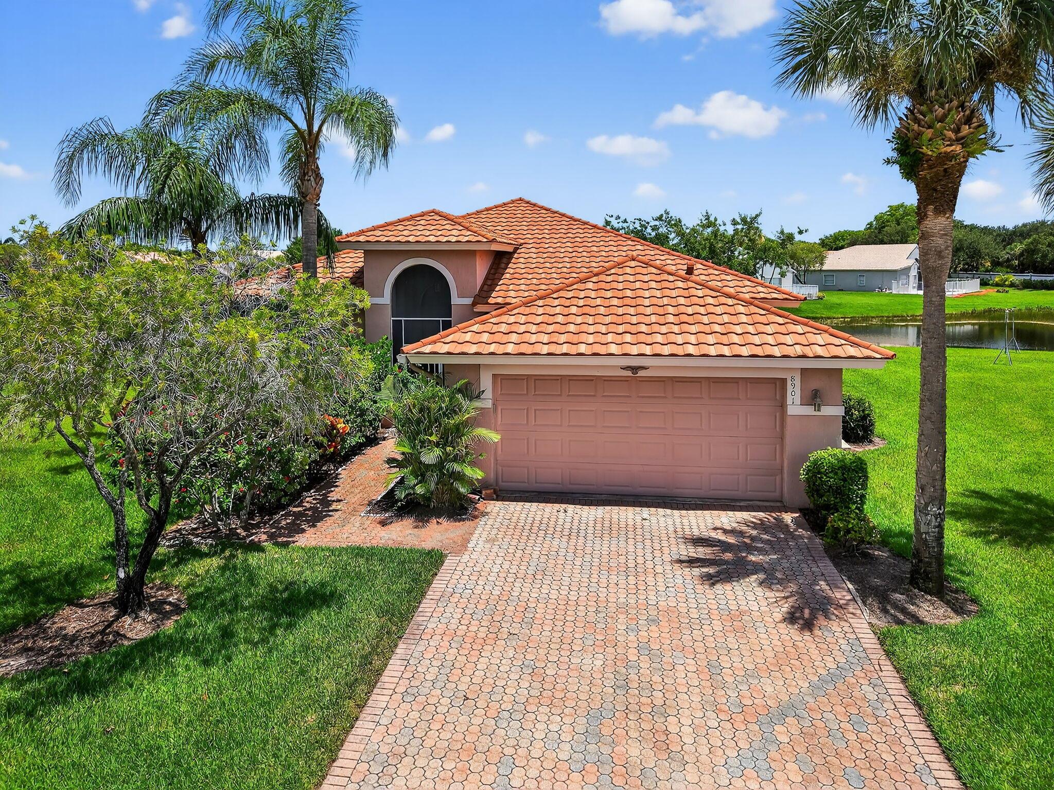 Welcome to your dream home in one of the area's most sought-after 55+ gated communities! This immaculate single-family residence offers 3 spacious bedrooms and 2 full baths, perfectly designed for comfort and style.The heart of the home features a bright white kitchen with elegant quartz countertops and sleek stainless steel appliances--ideal for entertaining or everyday living. The expansive main bedroom includes two walk-in closets and a well-appointed en-suite bath.Step outside to enjoy serene lake views from your patio--perfect for morning coffee or evening relaxation. Newer Metal Roof, newer AC and hot water heater. Community amenities are second to none, including a clubhouse with tennis, pickleball, bocce, a fitness center, cafe, sports bar, resort-style pool, and more.