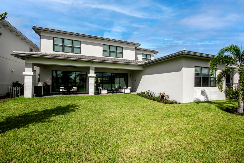Photo of 10050 Skyloft Street, Palm Beach Gardens, FL 33412 (MLS # B26078518)