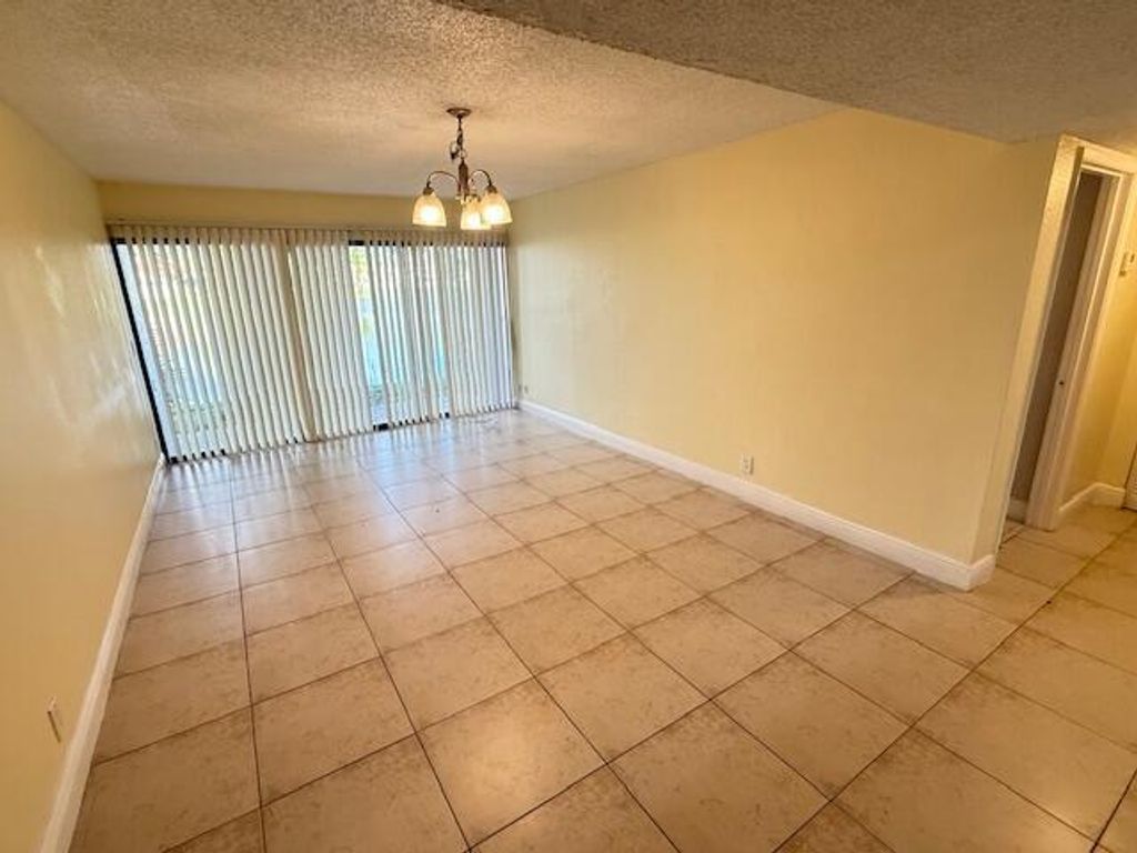 Photo of 1660 Windorah Way #C, West Palm Beach, FL 33411 (MLS # R11128881)