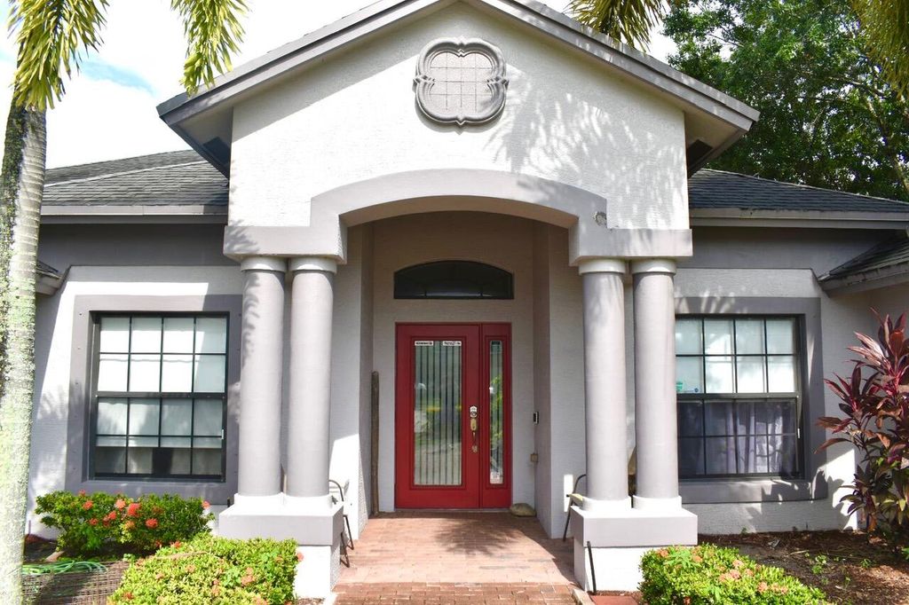 Photo of 501 SW Bayshore Boulevard, Port Saint Lucie, FL 34983 (MLS # B26012335)