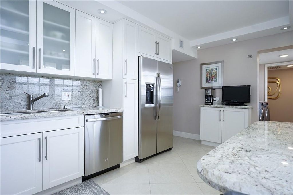 Photo of 3520 Oaks Way #709, Pompano Beach, FL 33069 (MLS # F10379654)