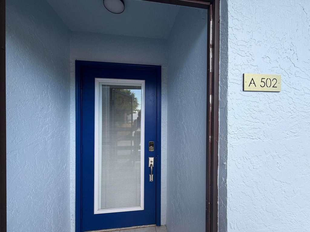 Photo of 1811 SW PALM CITY Road #A502, Stuart, FL 34994 (MLS # B26070088)