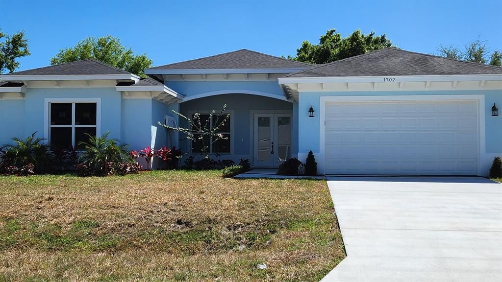 Photo of 1702 SW Aztec Avenue, Port St Lucie, FL 34953 (MLS # R10844622)
