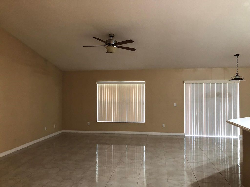 Photo of 705 SW Monsoon Road, Port Saint Lucie, FL 34953 (MLS # R10977930)