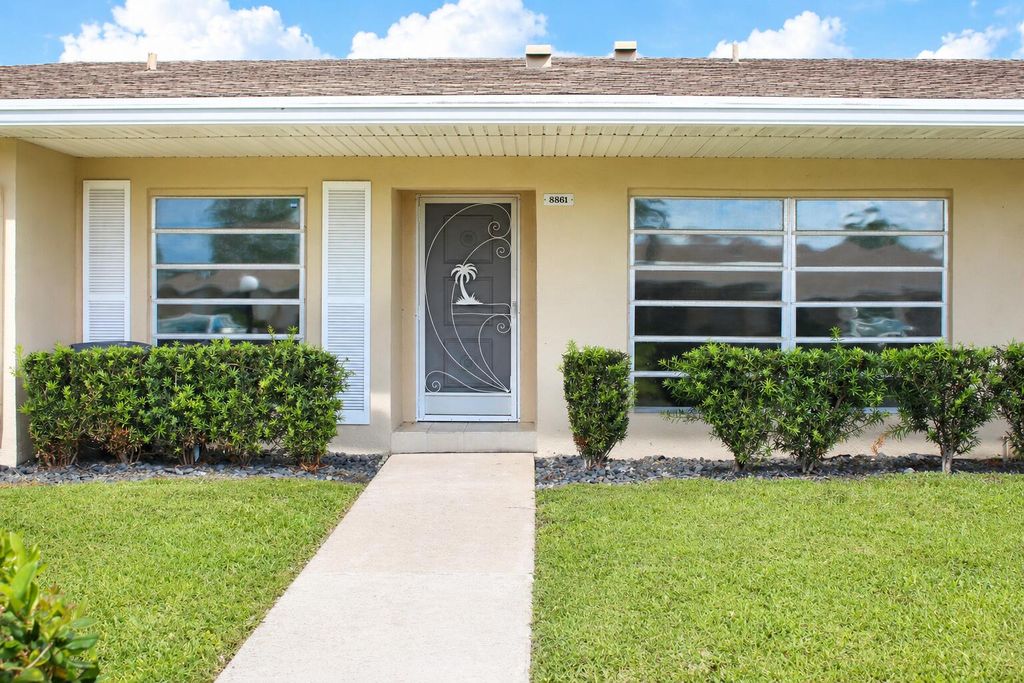 Photo of 8861 Bella Vista Drive, Boca Raton, FL 33433 (MLS # B26021859)