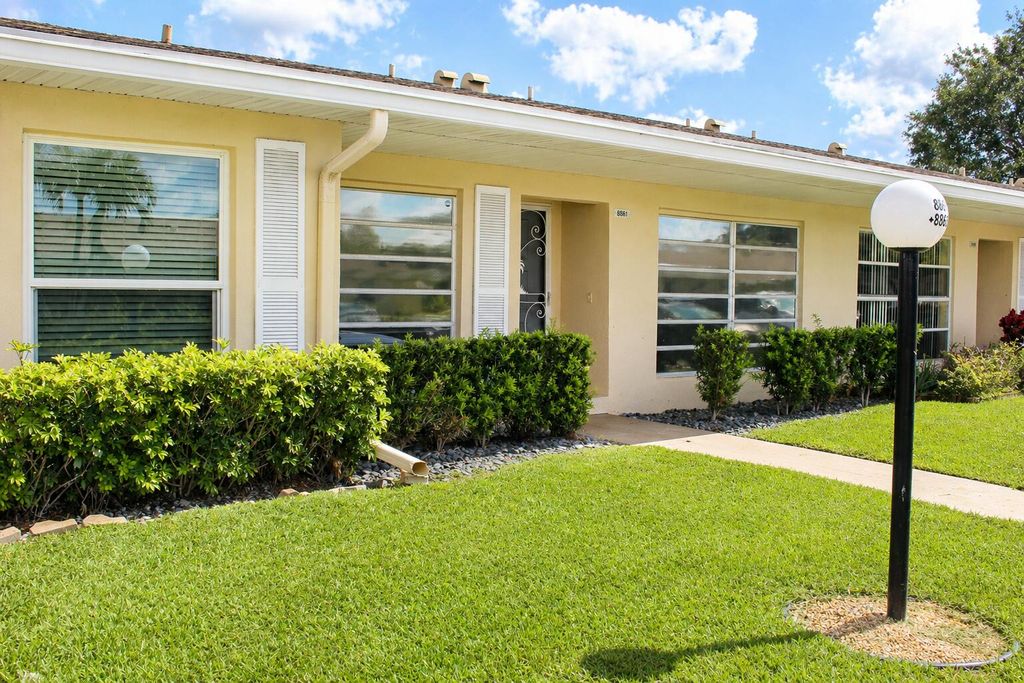 Photo of 8861 Bella Vista Drive, Boca Raton, FL 33433 (MLS # B26021859)