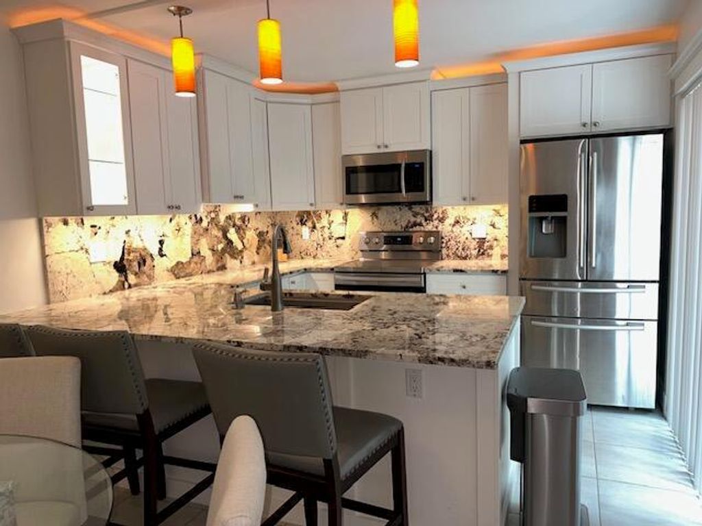 Photo of 2404 24th Court, Jupiter, FL 33477 (MLS # R11113272)