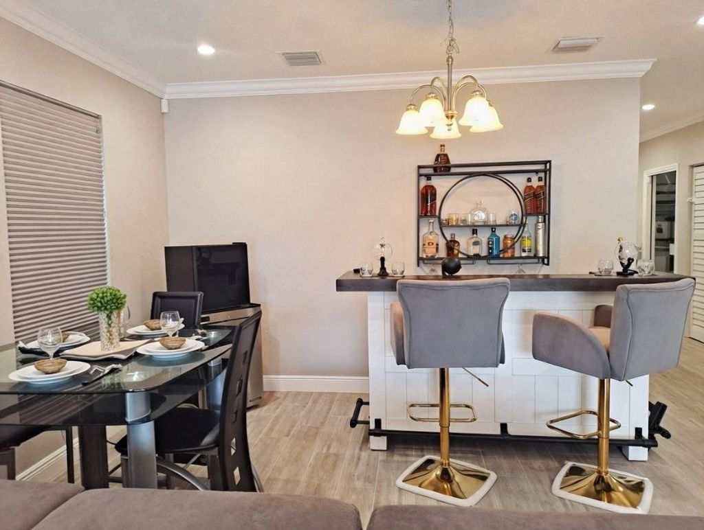 Photo of 1635 W 15th Street, Riviera Beach, FL 33404 (MLS # F10546395)