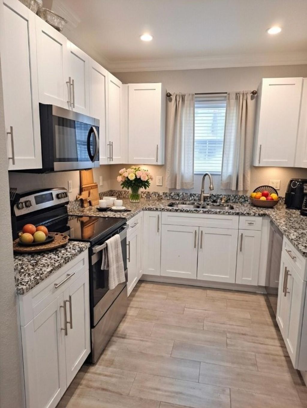 Photo of 1635 W 15th Street, Riviera Beach, FL 33404 (MLS # F10546395)