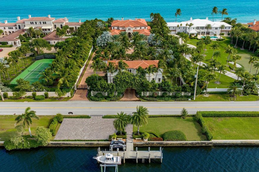 Spectacular Ocean-to-Lake Light and Bright Modern Mediterranean Compound with 9BR/11.3BA and 150 feet +/- of Ocean and Intracoastal frontage. This one-of-a-kind estate features rich details, intricate millwork, and sophisticated finishes. From spectacular reception to oversized living spaces and gorgeous formal dining room, this home is perfect for entertaining. Stunning wrought iron entryway opens to welcoming foyer with sweeping, detailed ceilings, beautiful imperial staircase, and crystal chandelier. Pristine estate with great natural sunlight throughout. Eat-in kitchen with island, china and silverware closet, and butler's pantry. Fabulous theater room connects to pub room with full bar. Paneled library with detailed fireplace. Expansive second floor primary wing with fireplace,