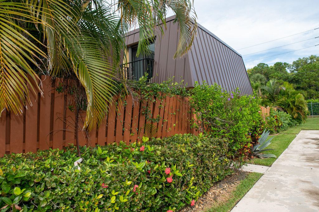 Photo of 5622 SE Windsong Lane, Stuart, FL 34997 (MLS # R10922161)