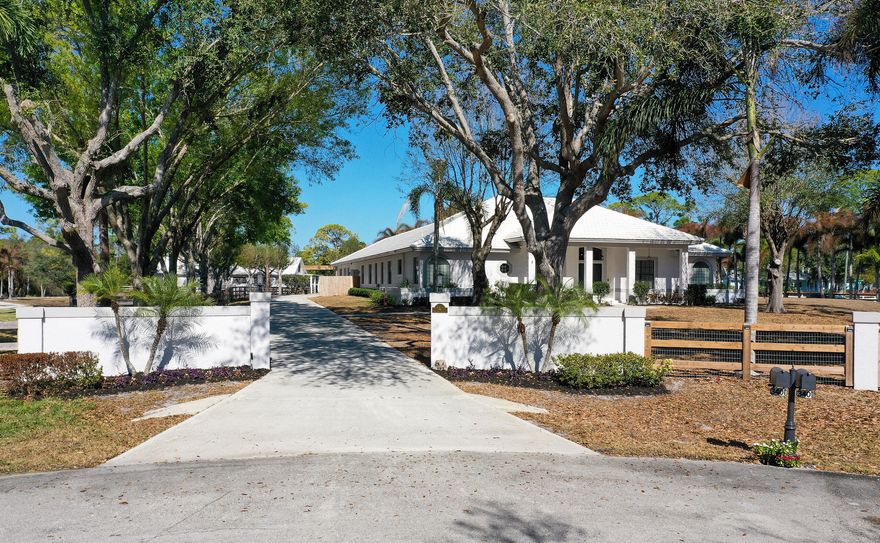 Completely renovated CBS multi-gen home with 5 bedrooms and 3 baths in main home and 2 bedroom 1 bath in attached guest house with full kitchen on 3 picturesque acres with mature oaks. For equestrian enthusiasts, this home has all new fencing with 3 paddocks in this premier guarded gated Equestrian community centrally located by I95 in Palm City and only 50 minutes to Wellington, the winter equestrian capital. It also includes an oversized 1,824 sq ft CBS workshop and 1,444 sq ft 5 stall barn with AC tack room and an oversized garage. Enjoy family time on the 1,000 sq of covered porches, in the outdoor kitchen that opens onto the enclosed pool area, or in the game room, family room, living room, or in the school office. Upgrades include all new flooring, new fencing, new kitchen & laundry. kitchen with all stone quartzite counters, newly painted inside and out, all remodeled bathrooms, new pool enclosure, pool heater and pump, and new water heaters. Golf & social memberships are available for the Cape Club