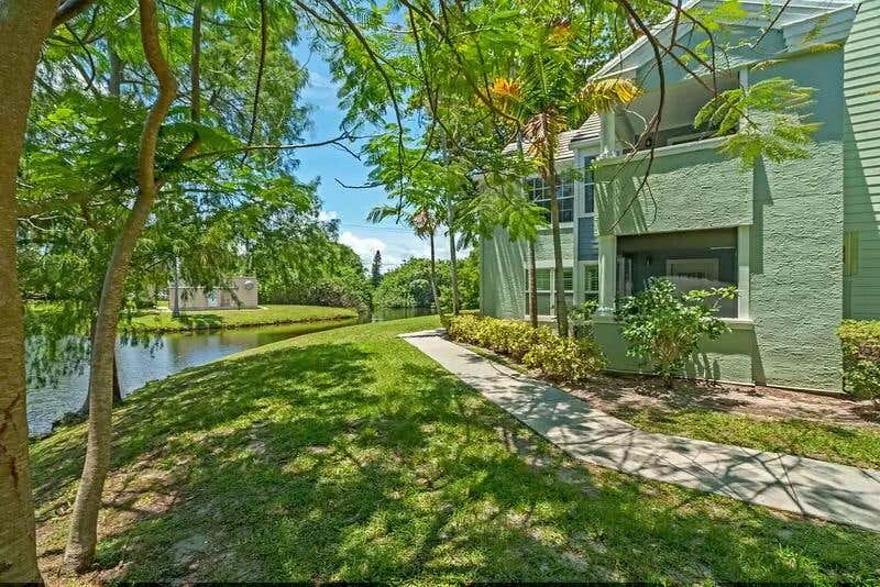 Photo of 1050 Crystal Way #C, Delray Beach, FL 33444 (MLS # B26046764)