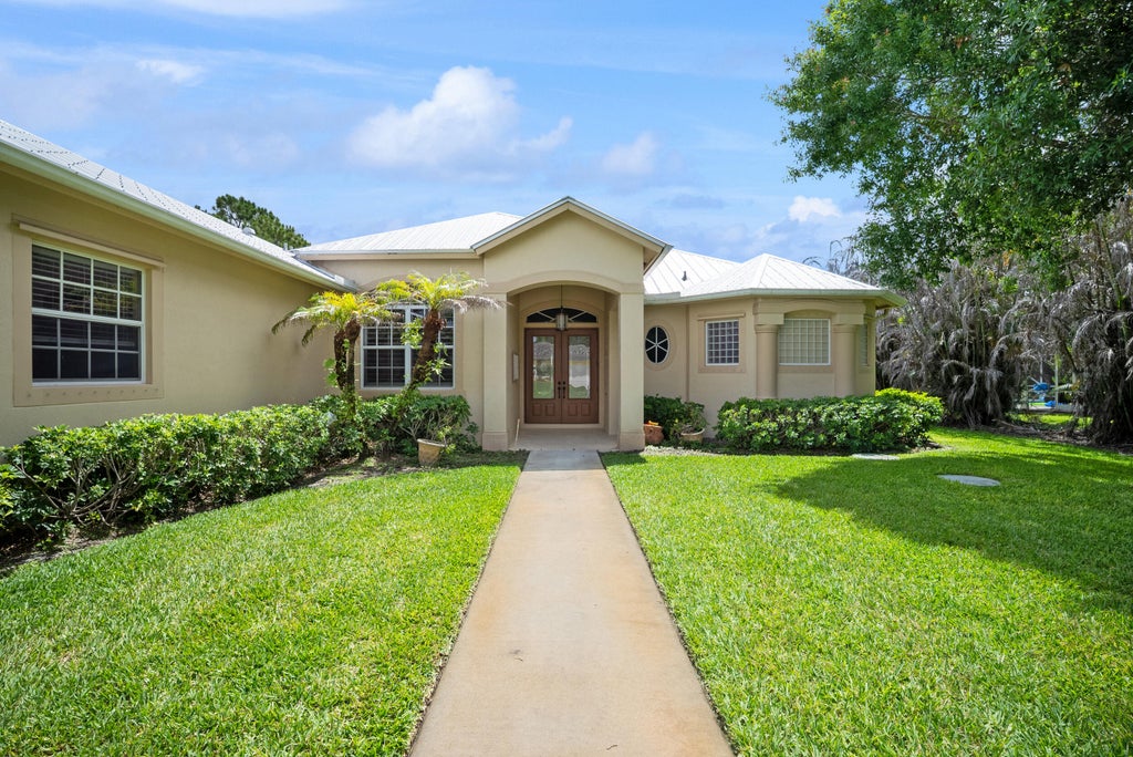 Photo of 1106 SW THOREAU Court, Palm City, FL 34990 (MLS # B26075902)