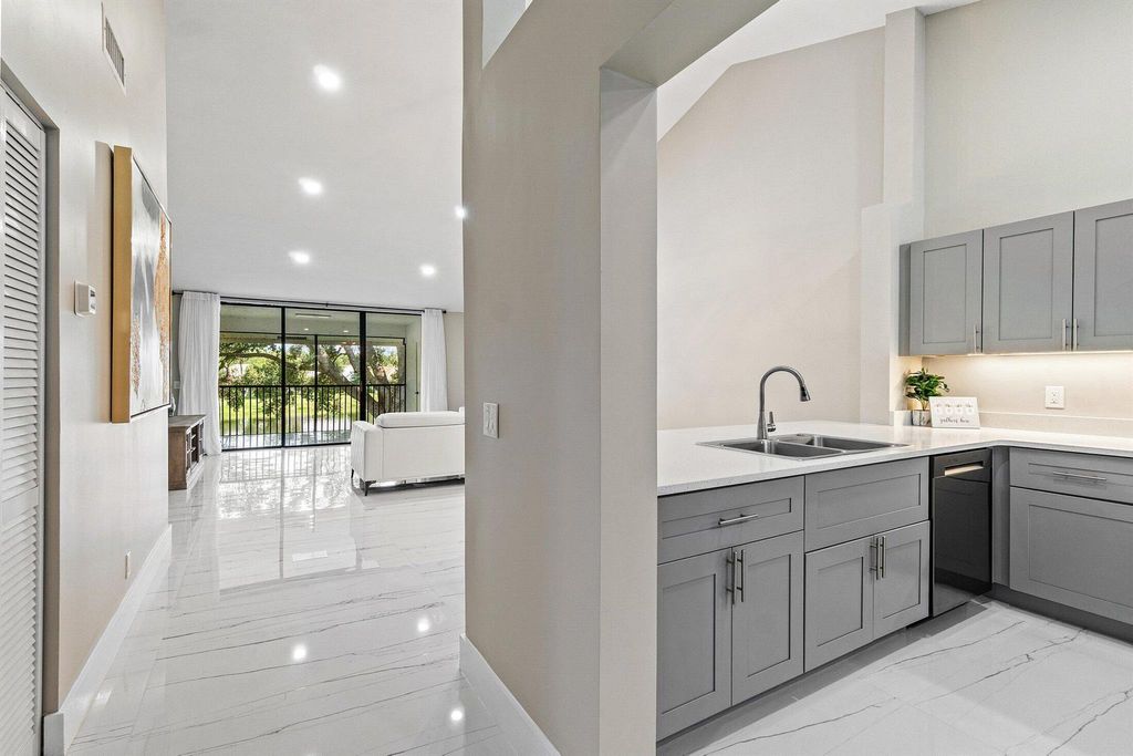 Photo of 6944 Briarlake Circle #203, Palm Beach Gardens, FL 33418 (MLS # R11106491)