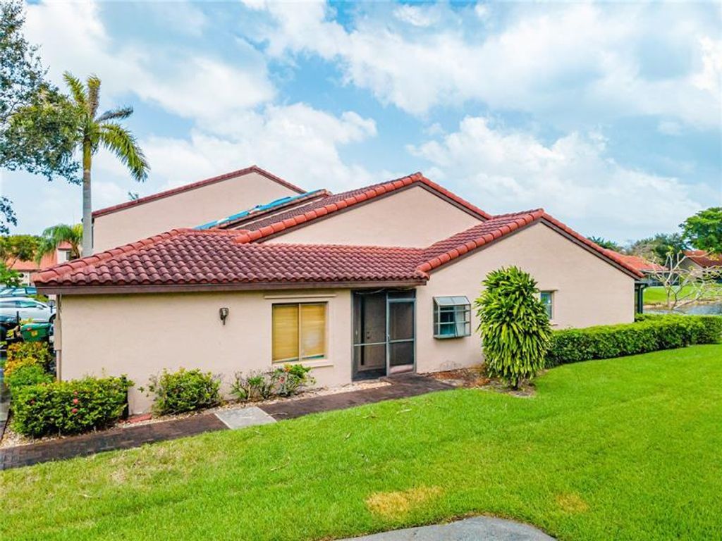 Photo of 3427 W Inverrary Blvd Boulevard W, Lauderhill, FL 33319 (MLS # B26000089)