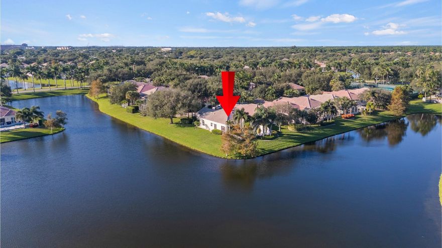 ULTIMATE PRIVACY AND LAKE VIEWS FROM EVERY ROOM ON AN OVERSIZED ENDCAP LOT. Rarely Available and Exceptionally Located, this beautifully maintained 3BR/2BA Divosta home in The Isles at Palm Beach Gardens sits on one of the community's most coveted lots surrounded by tranquil water views of three sparkling lakes. The expanded lot includes an additional parking pad for 2 cars. Inside, porcelain tile floors flow through an open layout with renovated kitchen, updated baths, and a spacious primary suite featuring pool views. The screened and covered lanai opens to a heated pool and spaAa''ideal for outdoor living year-round. Additional highlights include impact windows, a whole-house generator, laundry room, and screened front entry. Divosta quality, desirable schools, and a prime