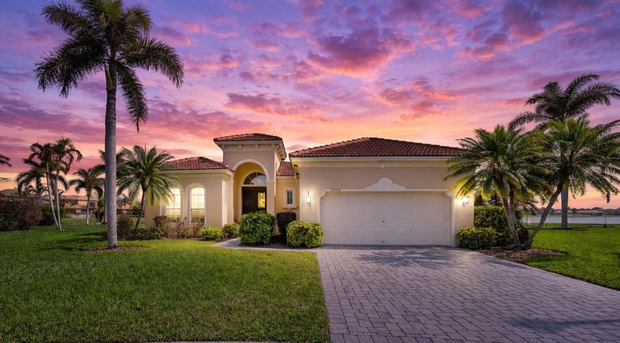 Experience luxury waterfront living in Portofino Shores! This beautifully updated Gallio on the Lake model offers stunning lake views and a bright, open layout. Features include a new roof (2025), renovated kitchen and bathrooms with premium finishes, plank tile flooring, plantation shutters, impact windows, and accordion shutters. Enjoy peaceful sunsets from the spacious screened lanai. Gated community with 24-hour security and resort-style amenities including pool, fitness center, and basketball court. ! Perfectly situated just minutes from Vero Beach, pristine Atlantic beaches, fine dining, and convenient access to I-95. This residence offers the ultimate blend of exclusivity and accessibility. Move-in ready and impeccably maintained—don't miss this exceptional opportunity Experience elevated living in this model-caliber waterfront residence, ideally positioned within the prestigious Portofino Shores community of North St. Lucie. Showcasing sweeping, million-dollar lake views, this impeccably maintained home offers a seamless blend of sophistication, comfort, and timeless design.  Every detail has been thoughtfully curated, including a brand-new roof (2025) and beautifully reimagined kitchen and baths featuring premium finishes and elegant plank tile flooring throughout. Plantation shutters enhance the home's refined aesthetic, while abundant natural light creates an inviting, airy ambiance. Impact windows and accordion shutters keep you safe during those Florida summer months.  Step outside to your expansive screened lanai—an idyllic setting for sunset dining, entertaining, or simply unwinding as tranquil water views stretch beyond the horizon.  This exceptional Gallio on the Lake model delivers both style and substance, offering a true move-in-ready luxury experience.  Residents of Portofino Shores enjoy a private, resort-inspired lifestyle with 24-hour manned security and an array of upscale amenities, including a sparkling pool, fitness center, basketball court, and beautifully maintained grounds—all with remarkably low HOA fees.  Perfectly situated just minutes from Vero Beach, pristine Atlantic beaches, fine dining, and convenient access to I-95, this residence offers the ultimate blend of exclusivity and accessibility.   This is more than a home—it's a statement of lifestyle. A rare opportunity not to be missed.