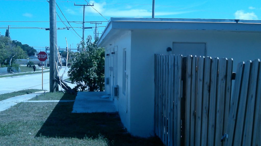 Photo of 900 W 9th Street, Riviera Beach, FL 33404 (MLS # B26031082)