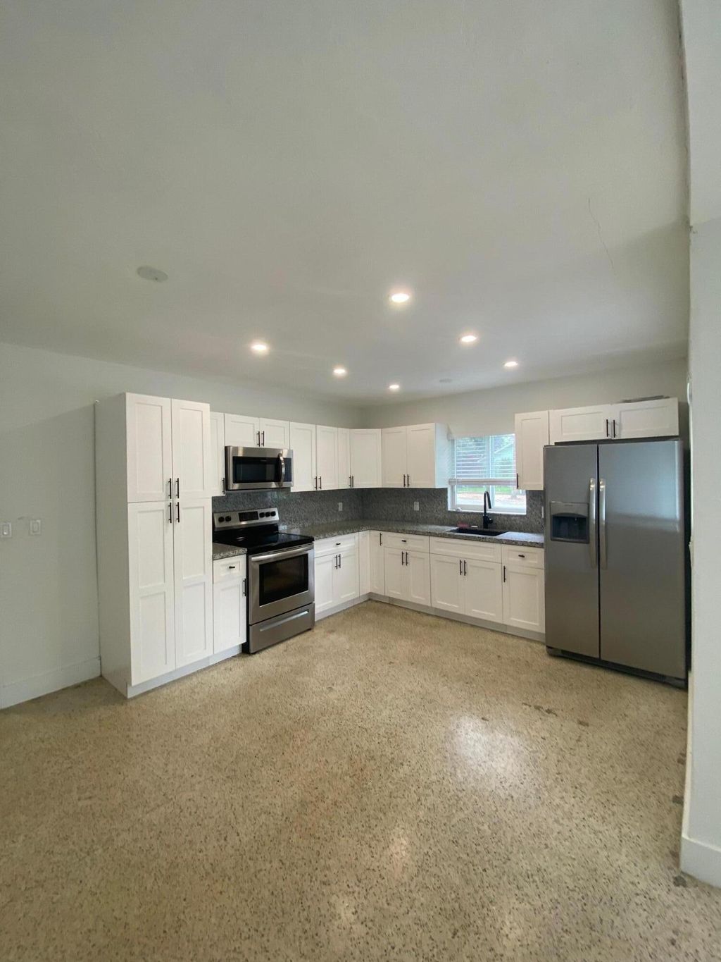 Photo of 1550 SW 23rd Court #A, Fort Lauderdale, FL 33315 (MLS # R10793311)