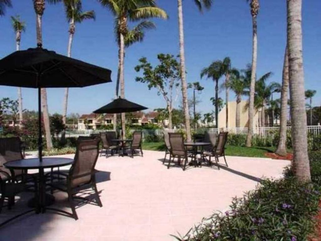 Photo of 631 Lyons Road #12-101, Coconut Creek, FL 33063 (MLS # F10537883)