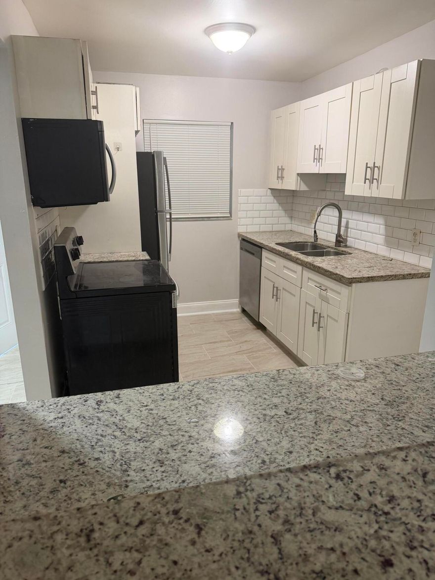 Fully renovated 2/1.5 located on the first floor. Beautiful tile floors, white wood cabinets, and granite counter tops with stainless steel appliances. Community pool, basketball court, and clubhouse gym. Water is included in the rent. Centrally located, close to major highways and shops.