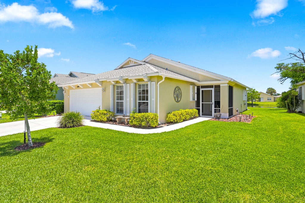 Photo of 440 SW Talquin Lane, Port Saint Lucie, FL 34986 (MLS # B26057055)